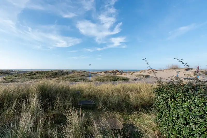 Uitzonderlijk doorloop-appartement aan het strand van Groenendijk. foto 23