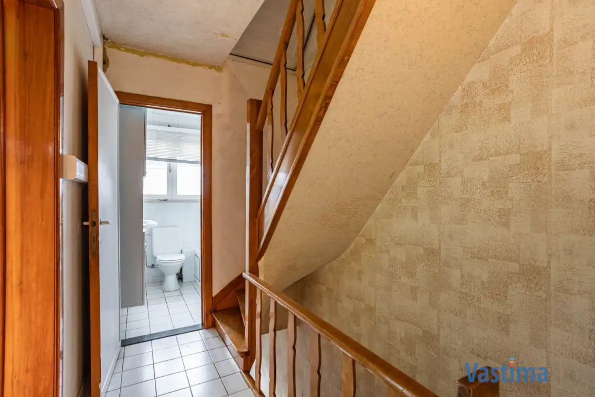 Op te frissen gezinswoning met 3 slaapkamers, garage en tuin foto 13