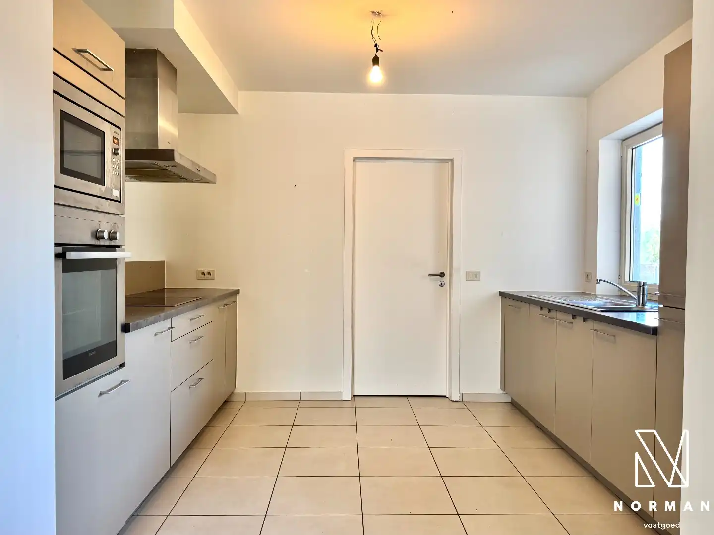 Gelijkvloers, instapklaar 2-slaapkamer appartement te koop met terras in centrum Bavikhove! foto 12