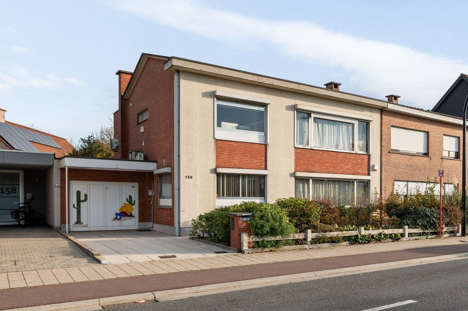 Karaktervolle halfopen woning met garage, oprit en gezellige tuin nabij het centrum van Borsbeek! foto 26