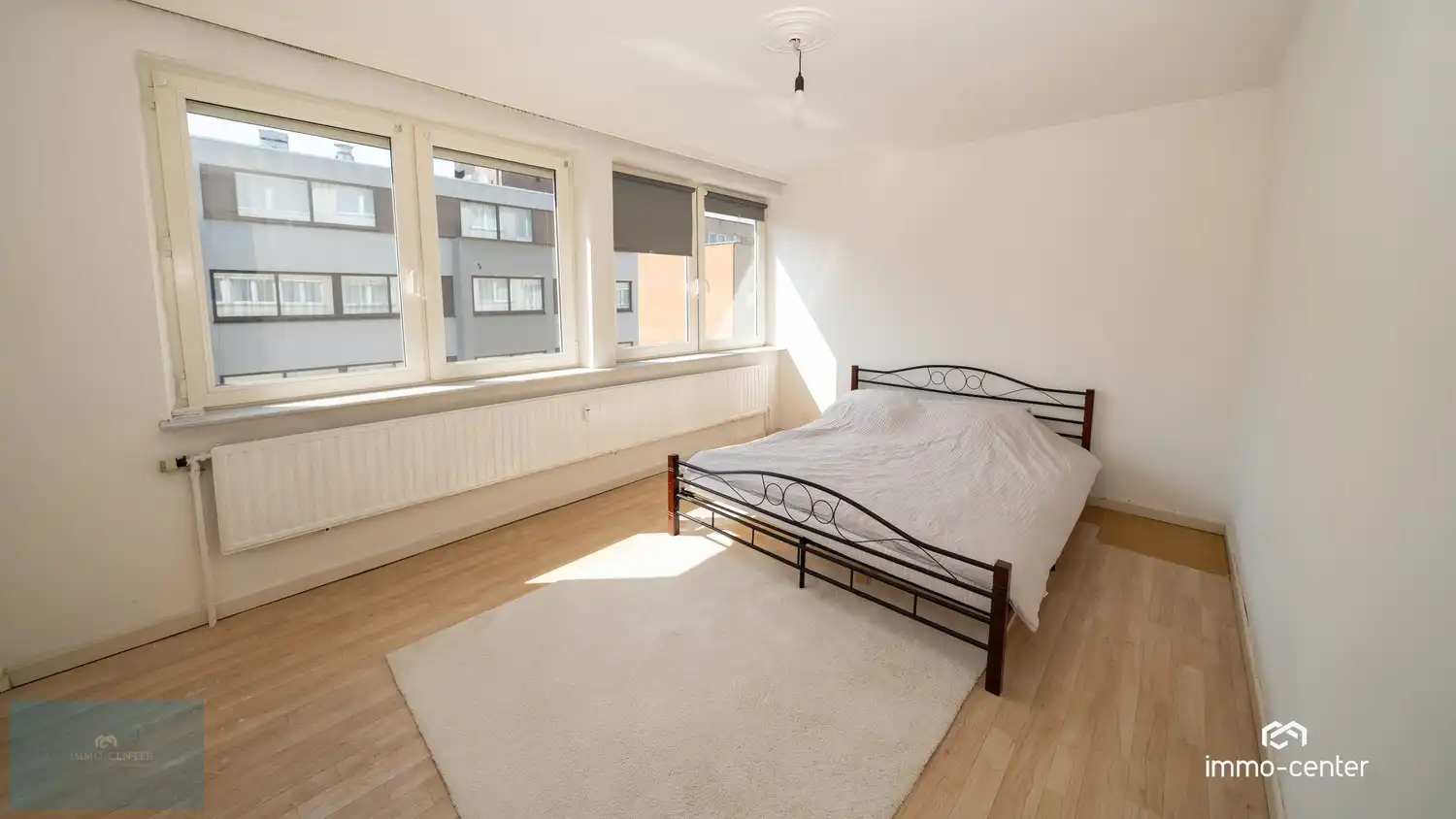 Te huur – Ruim 2-slaapkamerappartement met autostaanplaats in het centrum van Genk foto 10