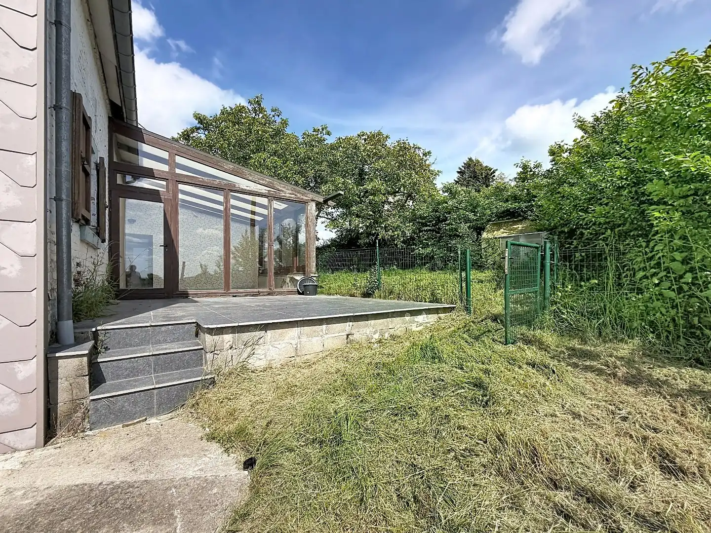 Ruime open bebouwing met zonnige tuin in Hoegaarden foto 3