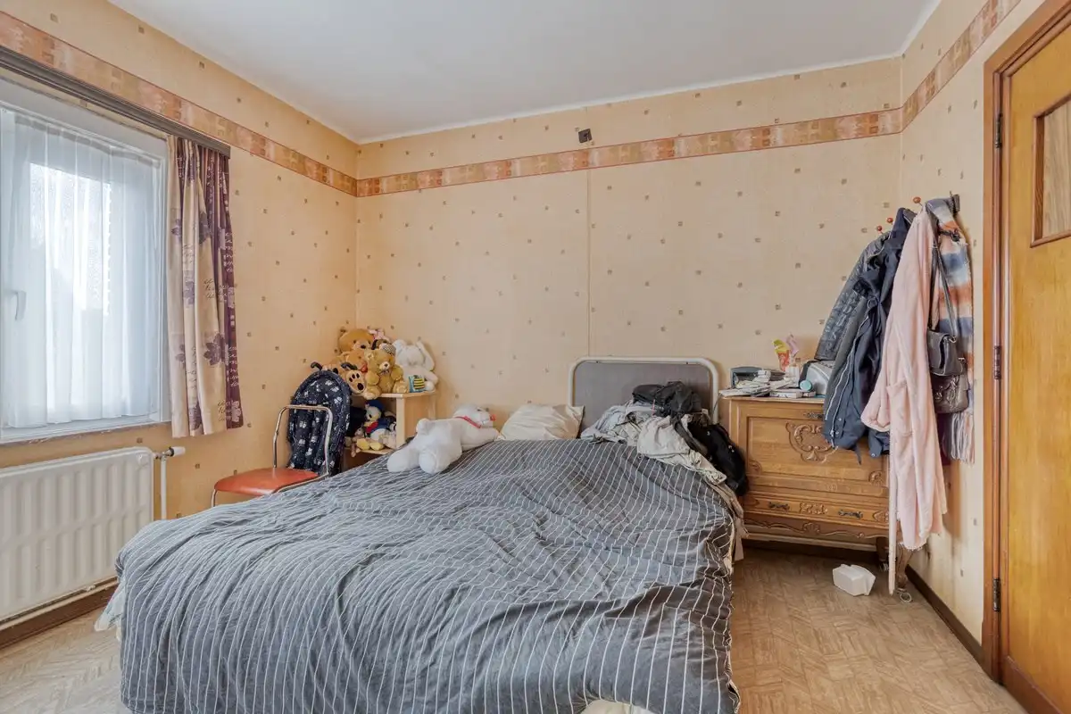 Te renoveren woning en 2 bouwgronden foto 8