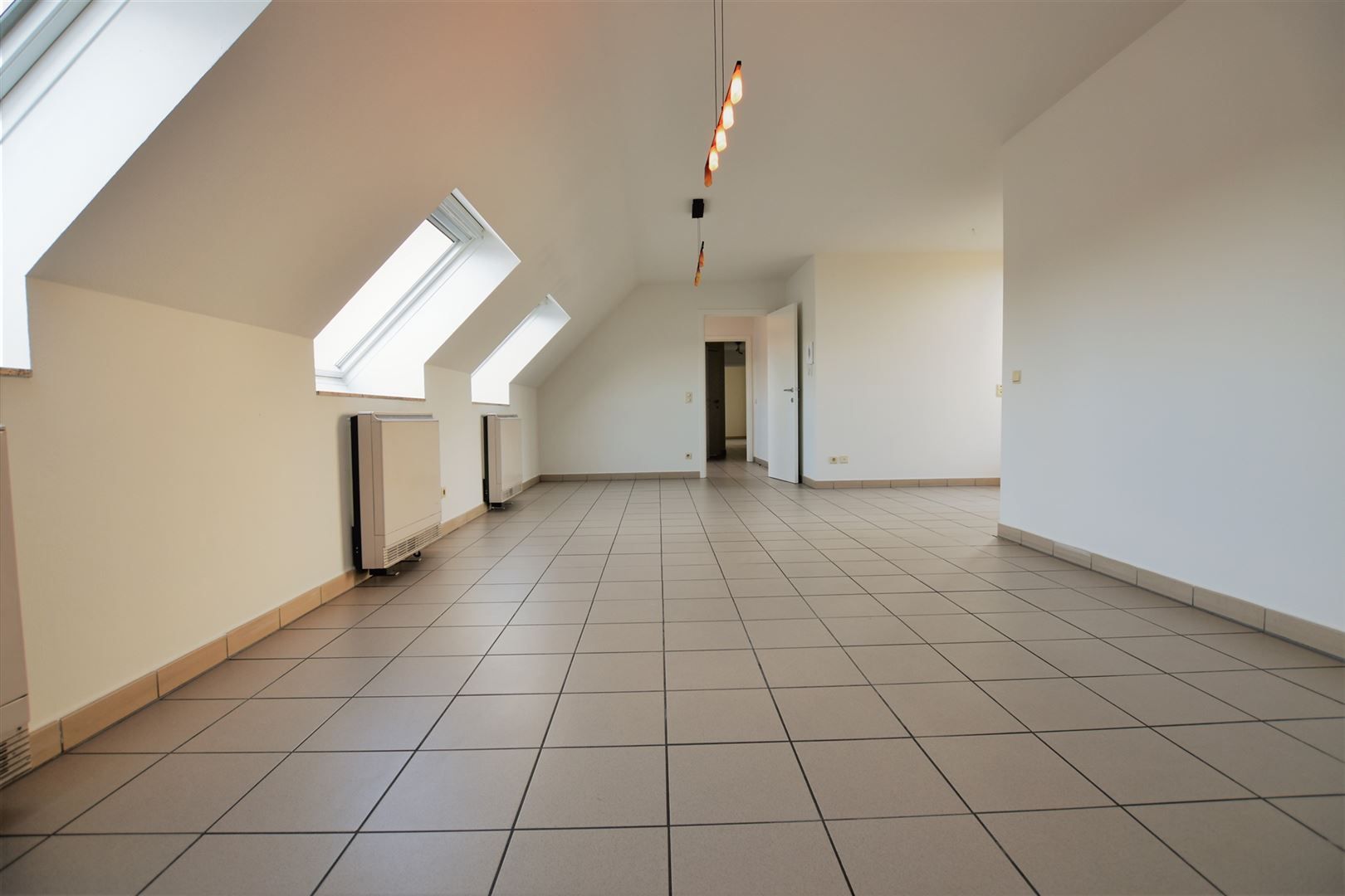 Ruim dakappartement (111m²)  met 3 slpk's en terras foto 8