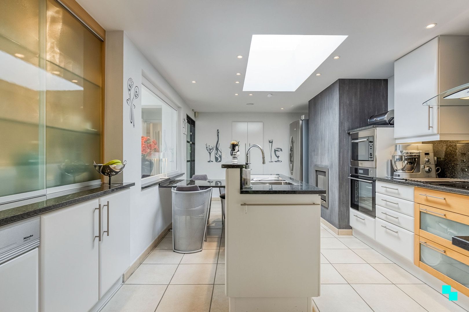 Woning met uitbreidingsmogelijkheden en gezellige tuin in het hart van Merelbeke foto 7