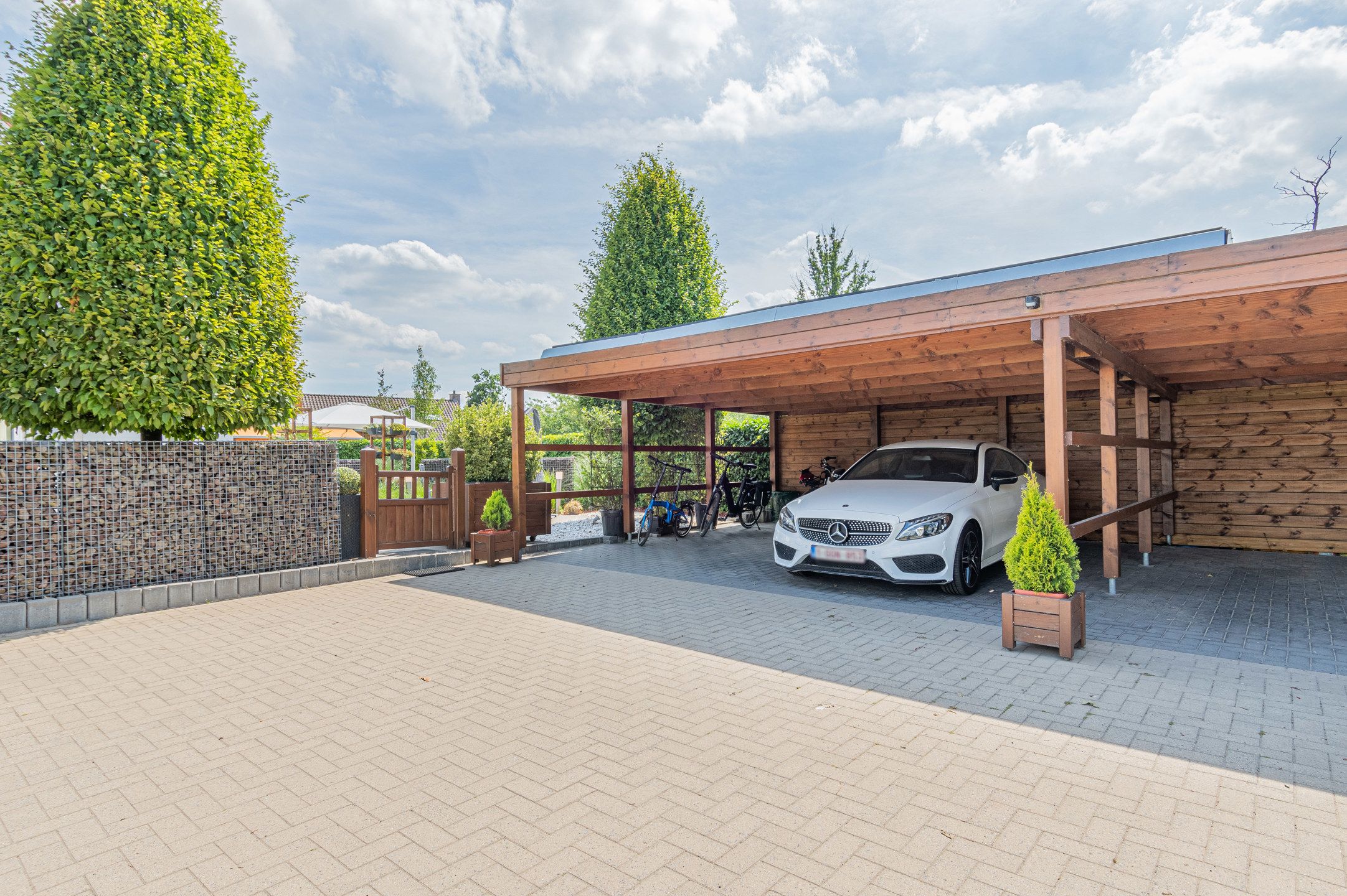 Prachtig gelijkvloers appartement met tuin & dubbele carport foto 23