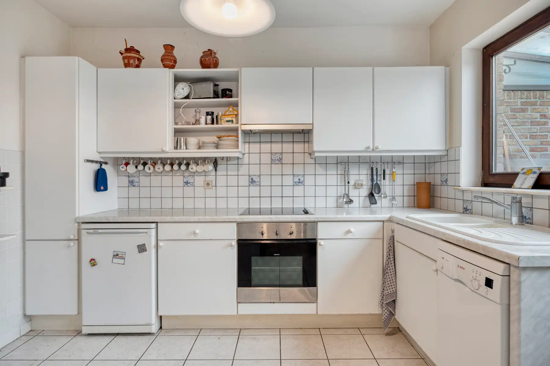 Ruime halfopen gezinswoning met tuin te Dilbeek foto 10