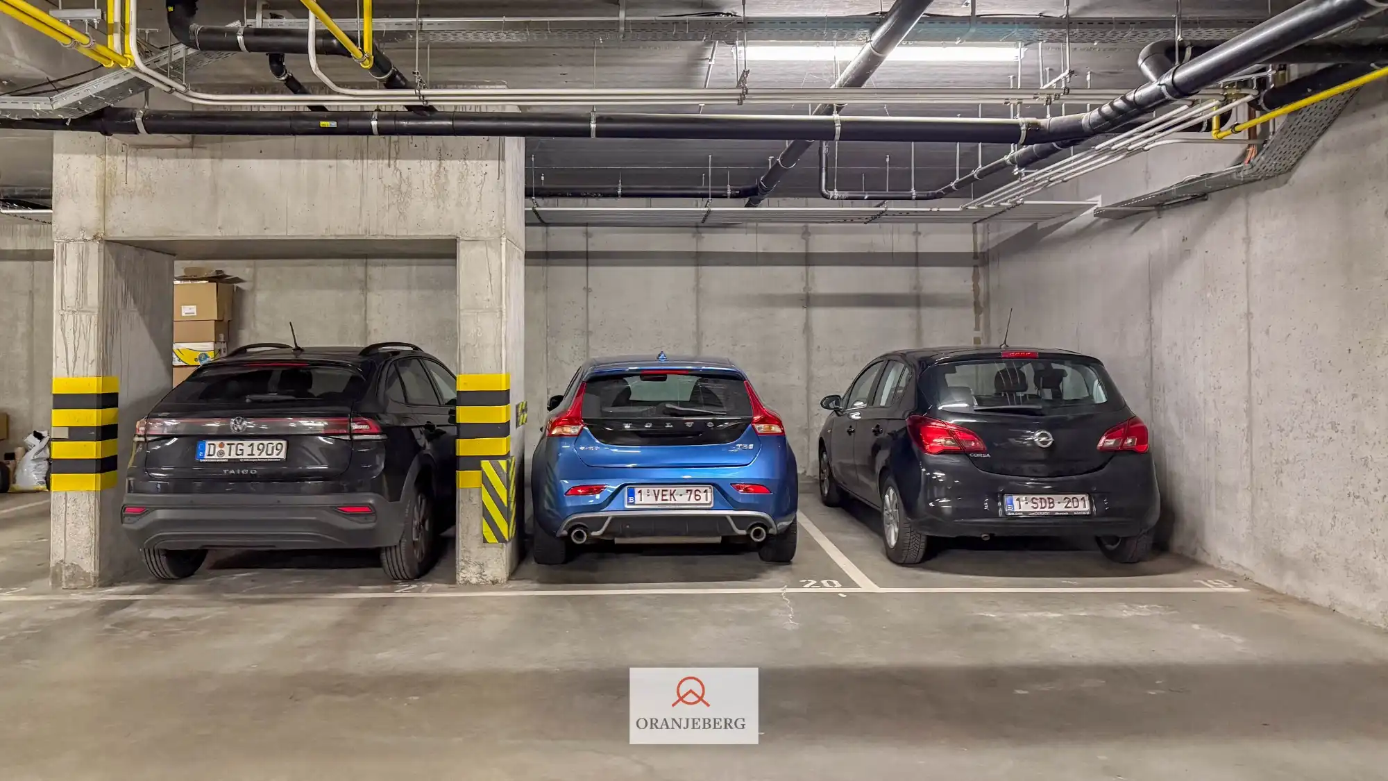 Nieuwbouw autostaanplaats te huur in afgesloten parkeergarage nabij Gent centrum foto 6