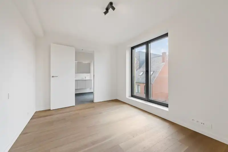 Modern luxe nieuwbouwappartement te koop in Roeselare met gunstige oriëntatie foto 6