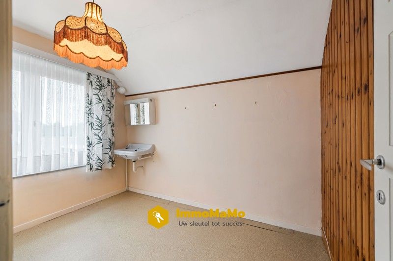 Te renoveren woonst in een rustige wijk te koop in Moerbeke foto 17