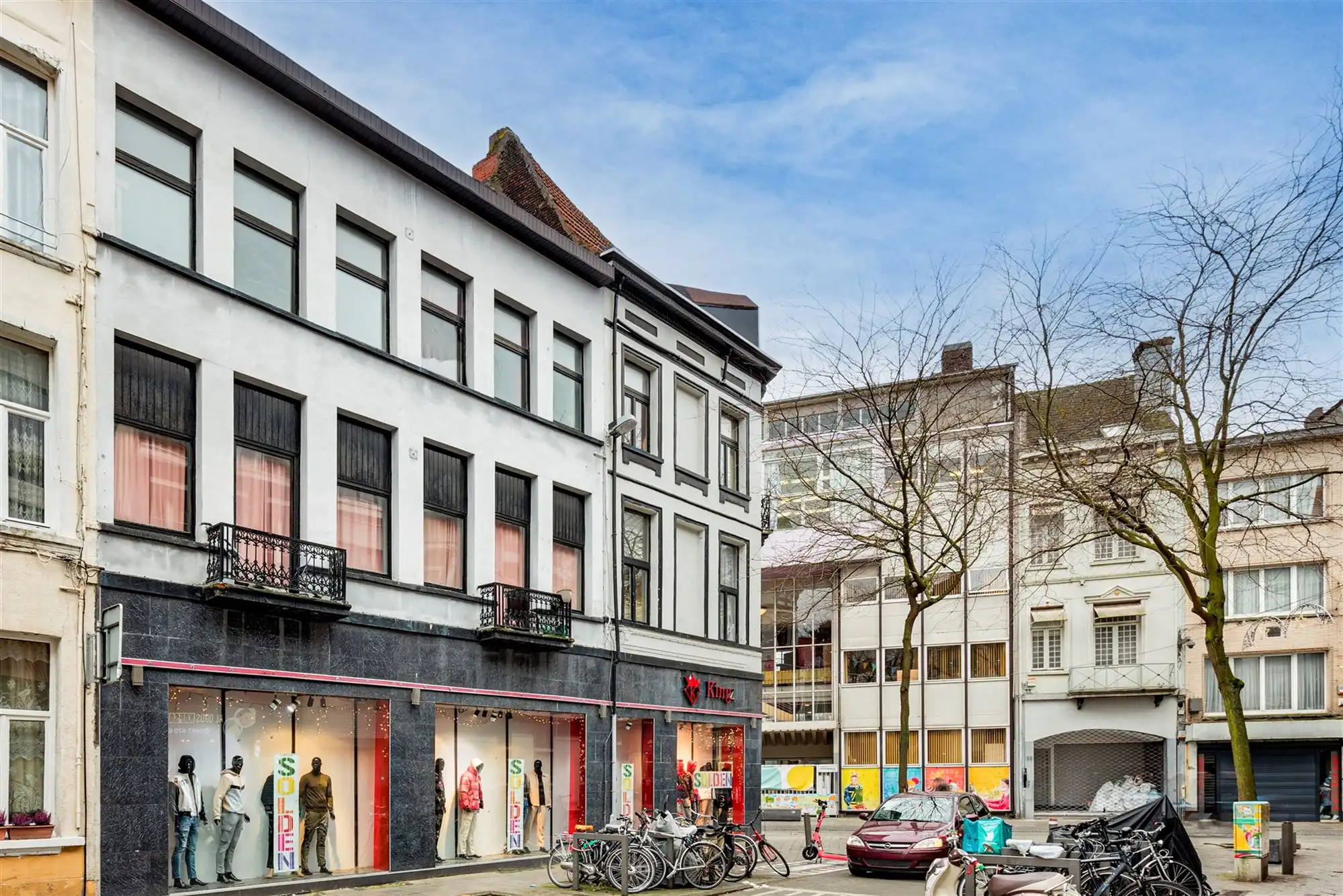 Hoekpand bestaande uit handelsglvl + 6 appartementen foto 3