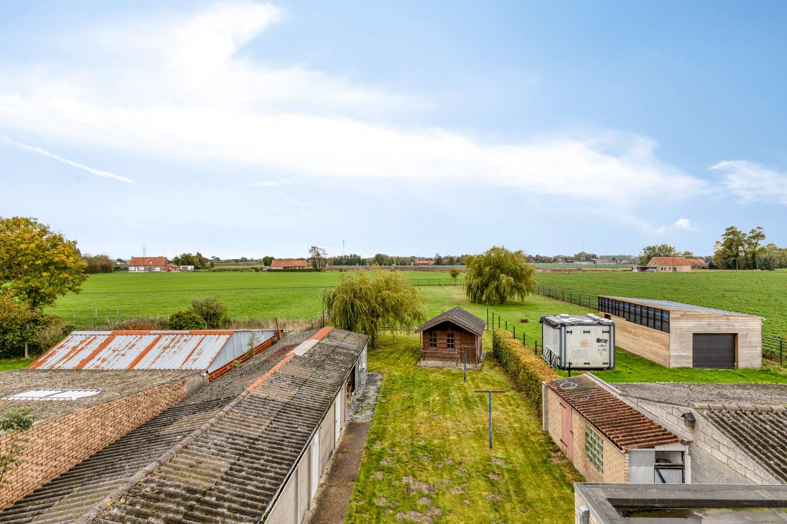Te renoveren halfopen bebouwing met ruime garage en tuin op 691 m² foto 12