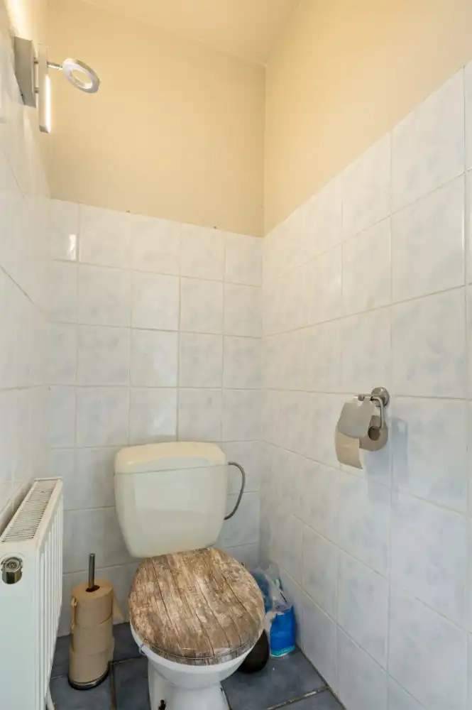 Praktijkruimte/winkel met bovenliggend duplex-appartement in het centrum van Berendrecht foto 9