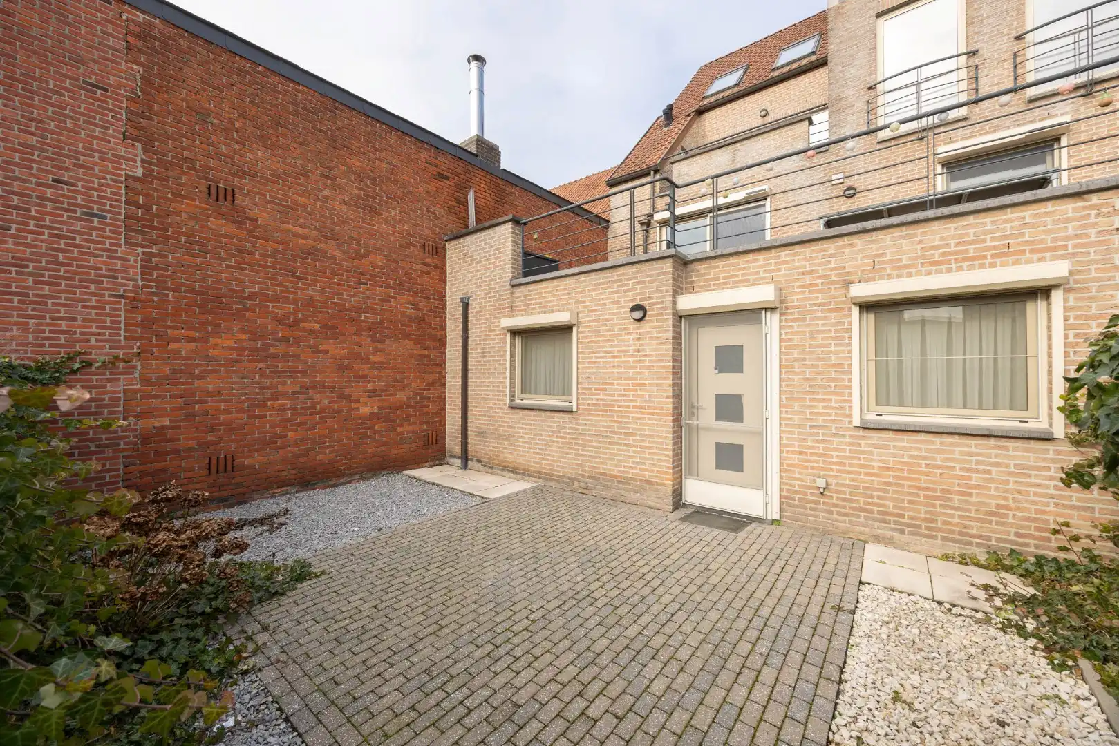 Ruim gelijkvloers appartement met terras en 2 slaapkamers te Overpelt centrum. foto 20