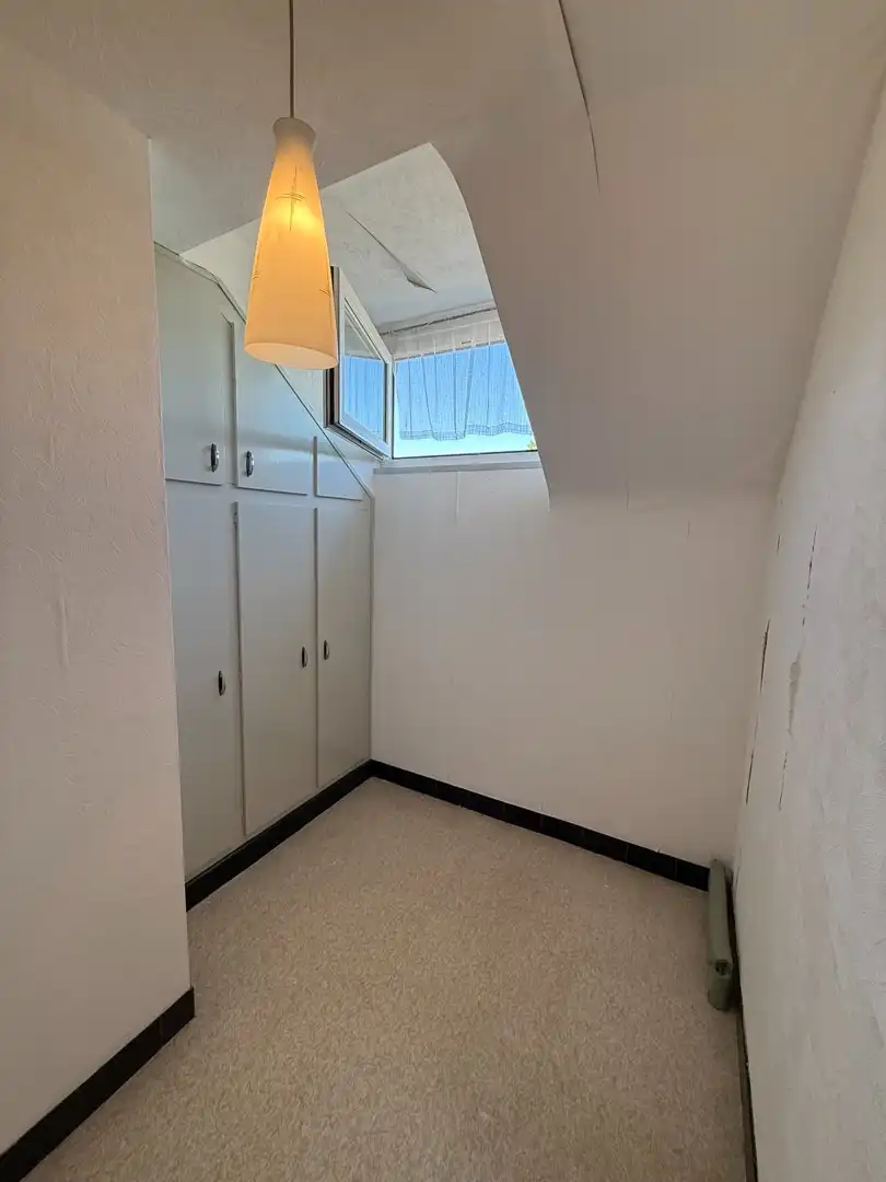 Ruime woning met 2 slaapkamers, veranda en volledig omheinde tuin te Heppen foto 28