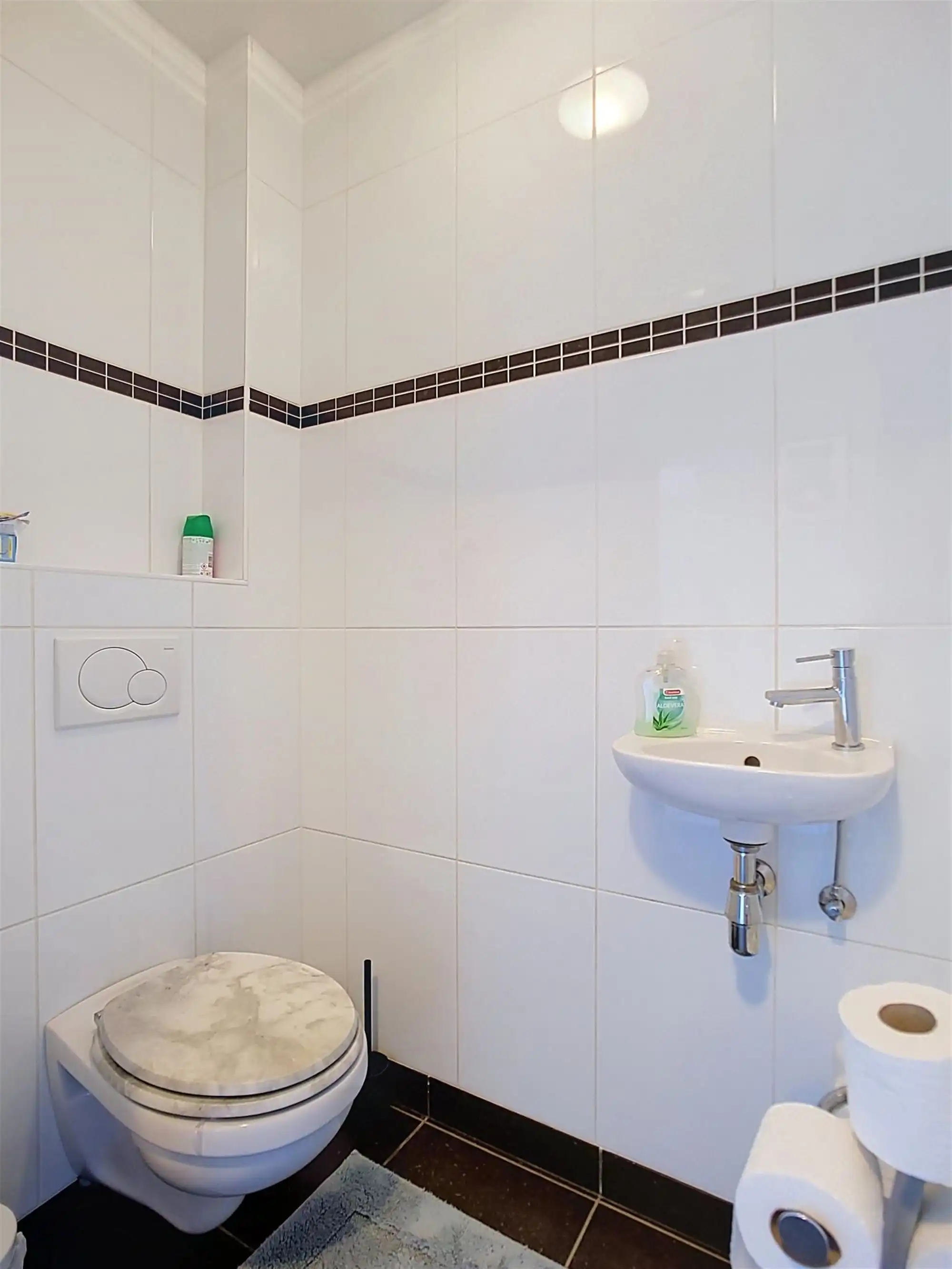 Ruim en verzorgd appartement met 2 slaapkamers, terras en autostaanplaats in centrum Itegem foto 10