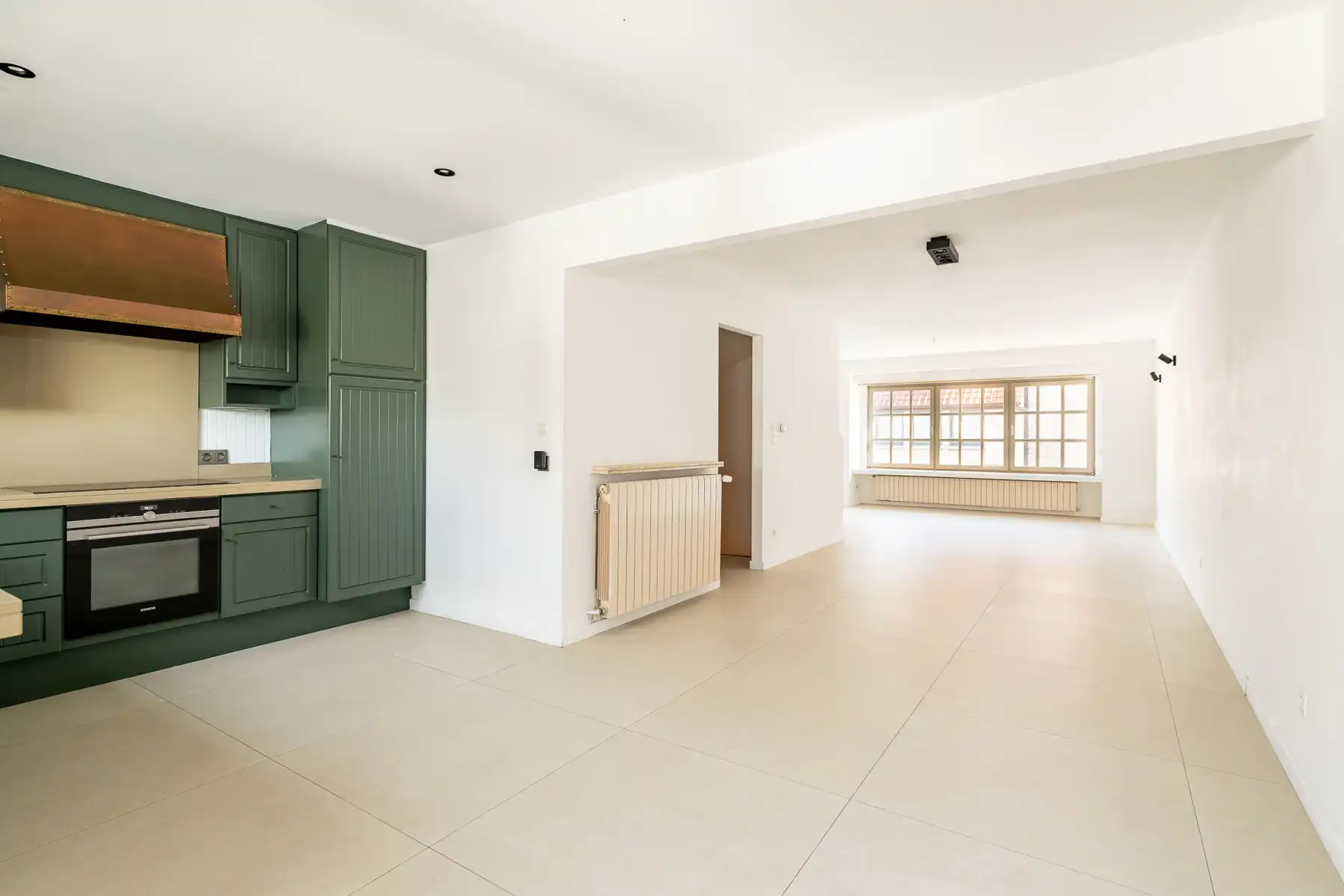 Pittoreske ongemeubelde woning met garage gelegen in Oud Knokke foto 5