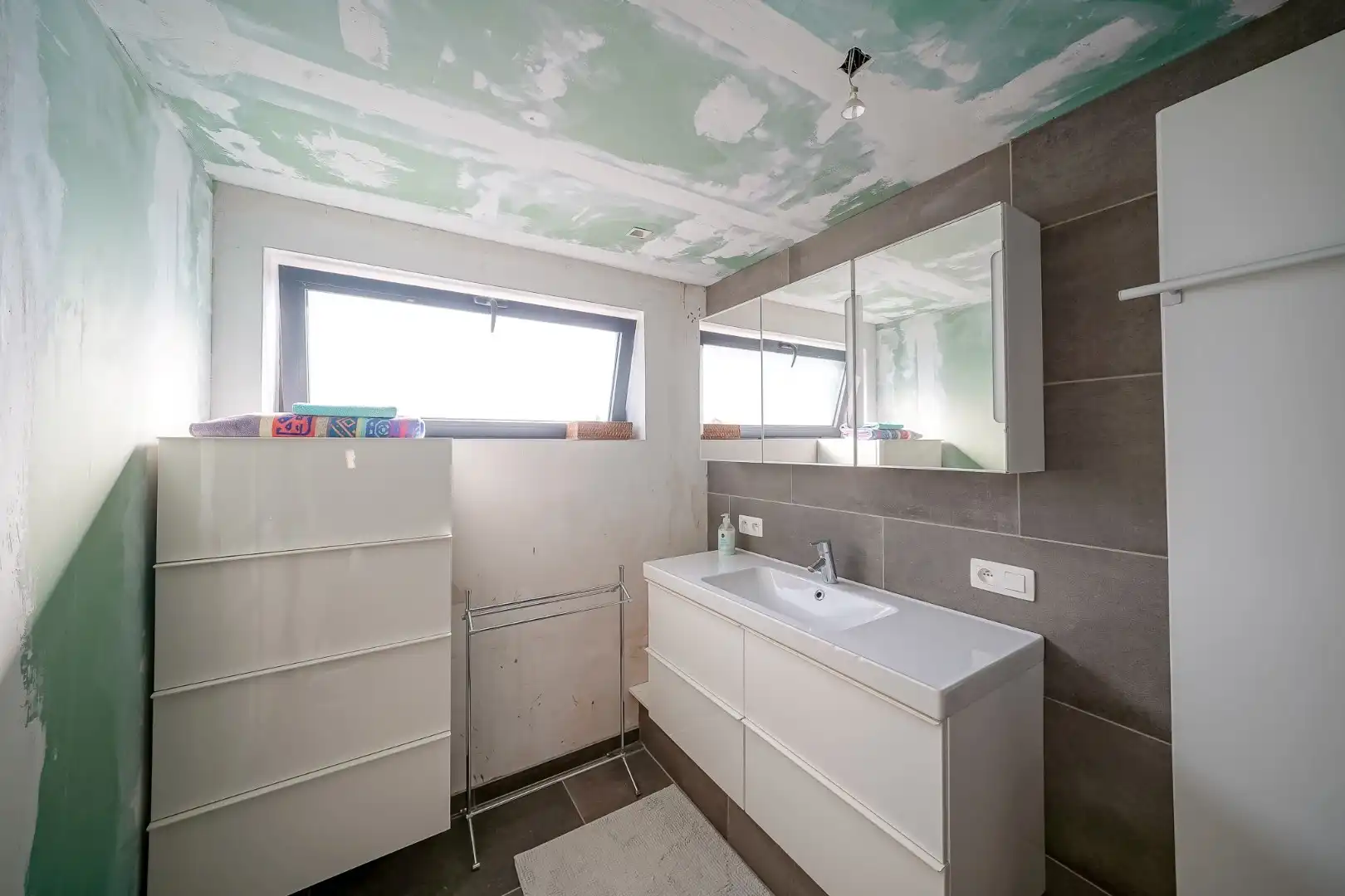 Ruime eengezinswoning in centrum Oudenburg met handelsruimte op gelijkvloers. foto 22