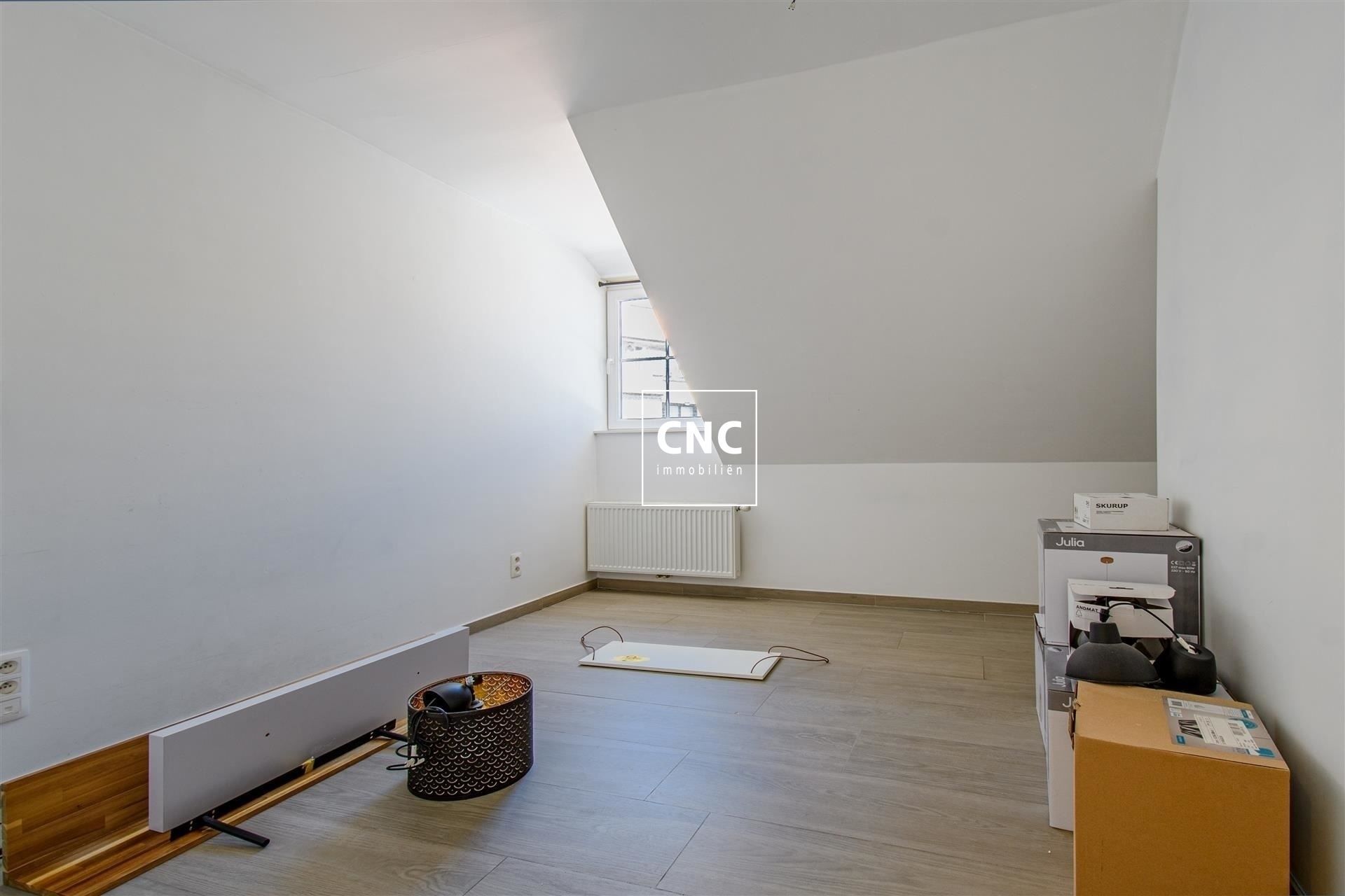 Lichtrijk en prachtig afgewerkt duplex-appartement foto 10