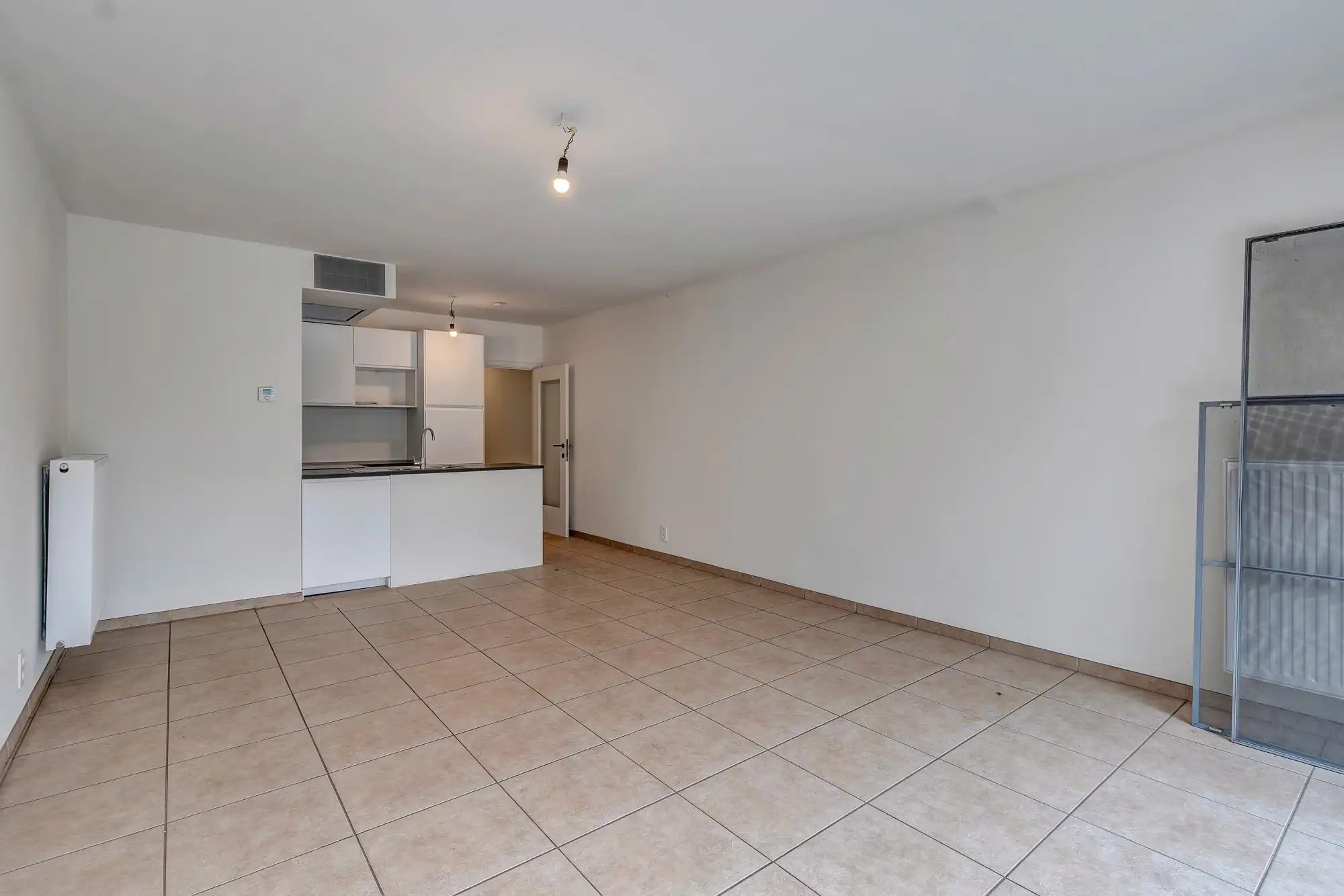 Instapklaar gelijkvloers appartement met tuin nabij centrum foto 4