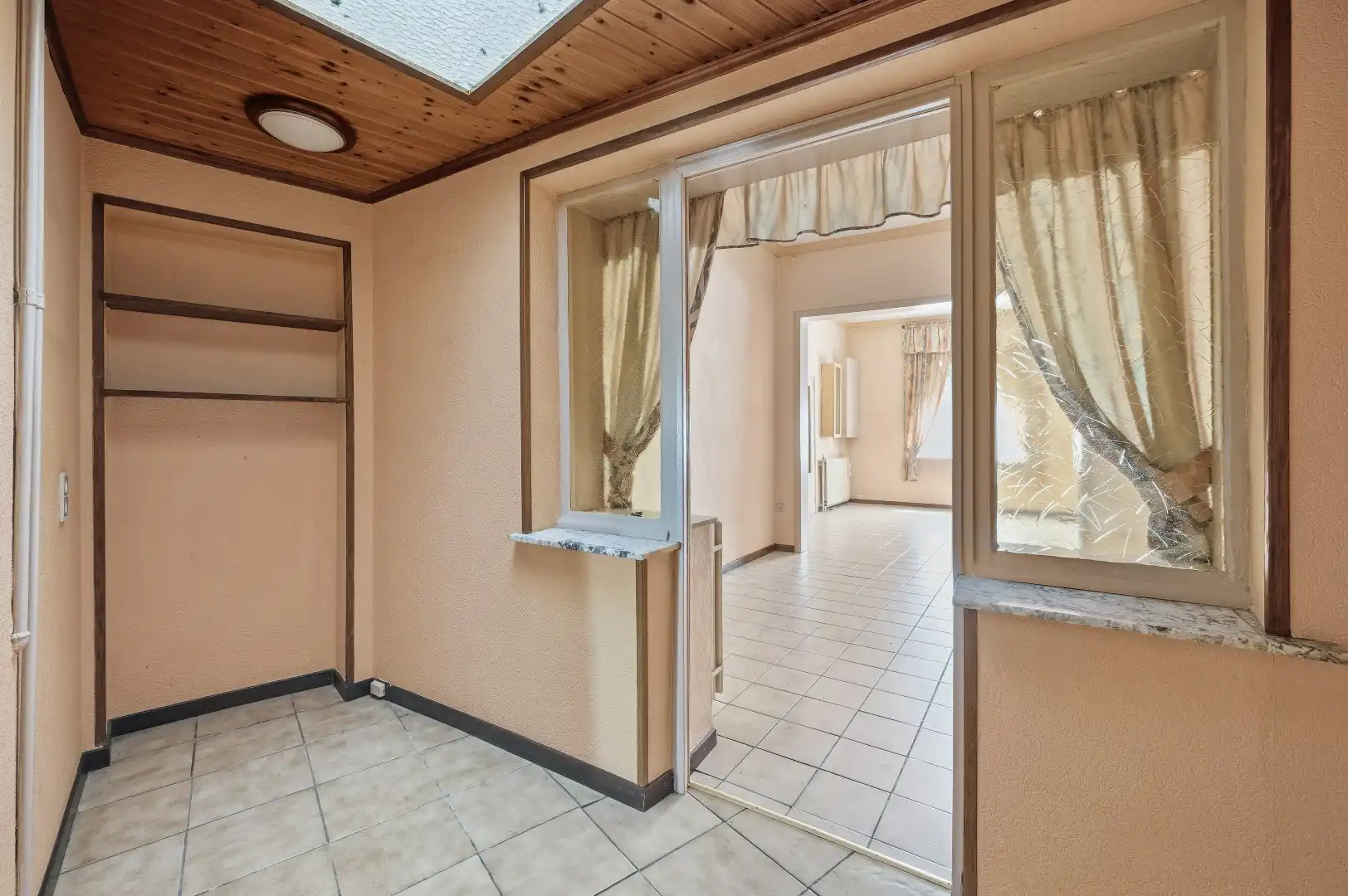 Te renoveren rijwoning in Attenhoven met tuin, garage en 3 slaapkamers foto 9