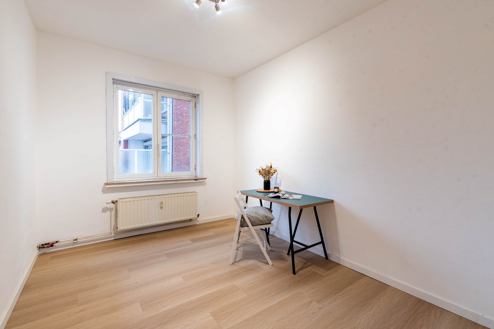 Vernieuwd en centraal gelegen 2-SLK appartement! foto 7