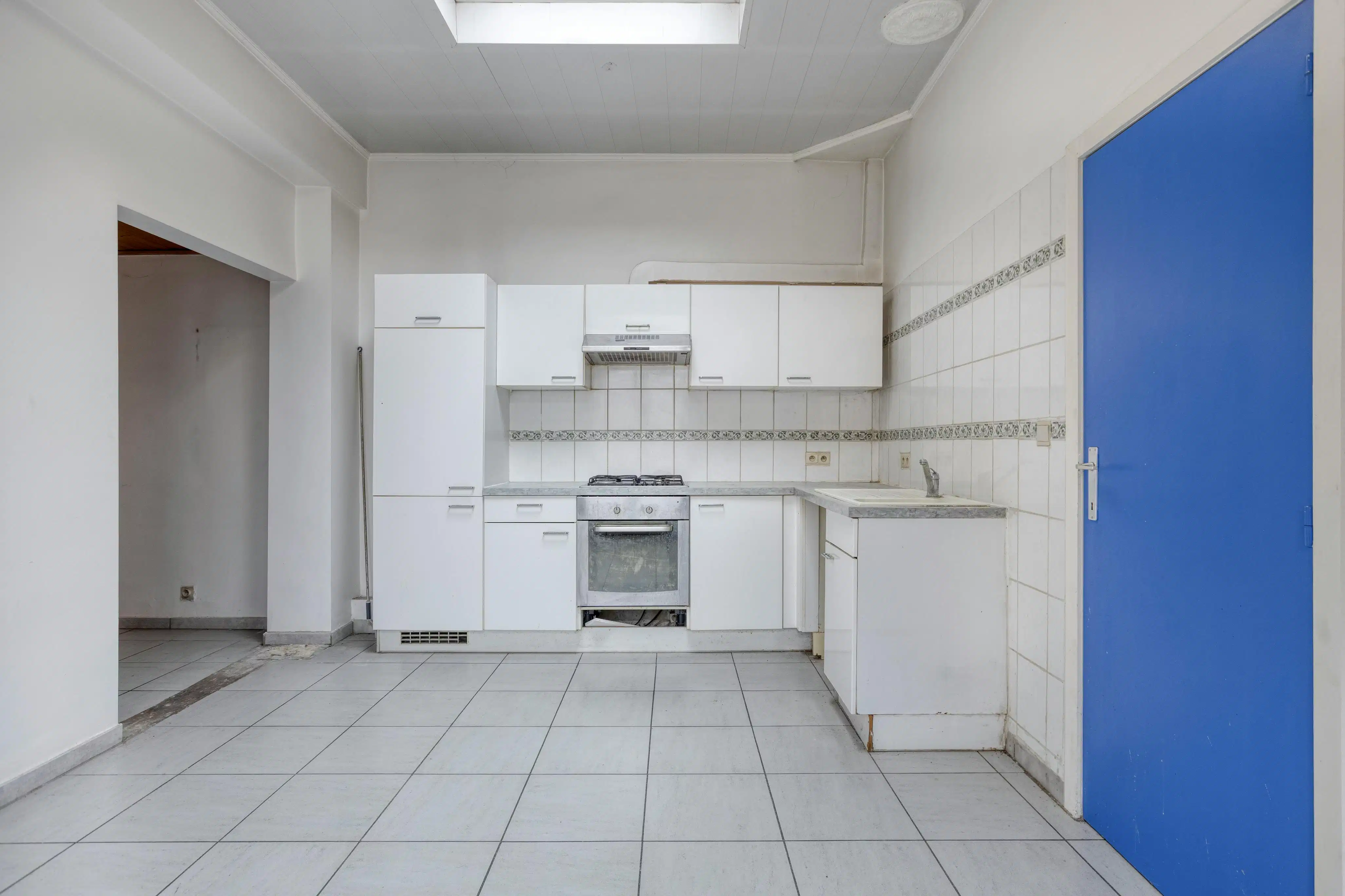 Te renoveren woning te koop in Brugge nabij de Vesten foto 4