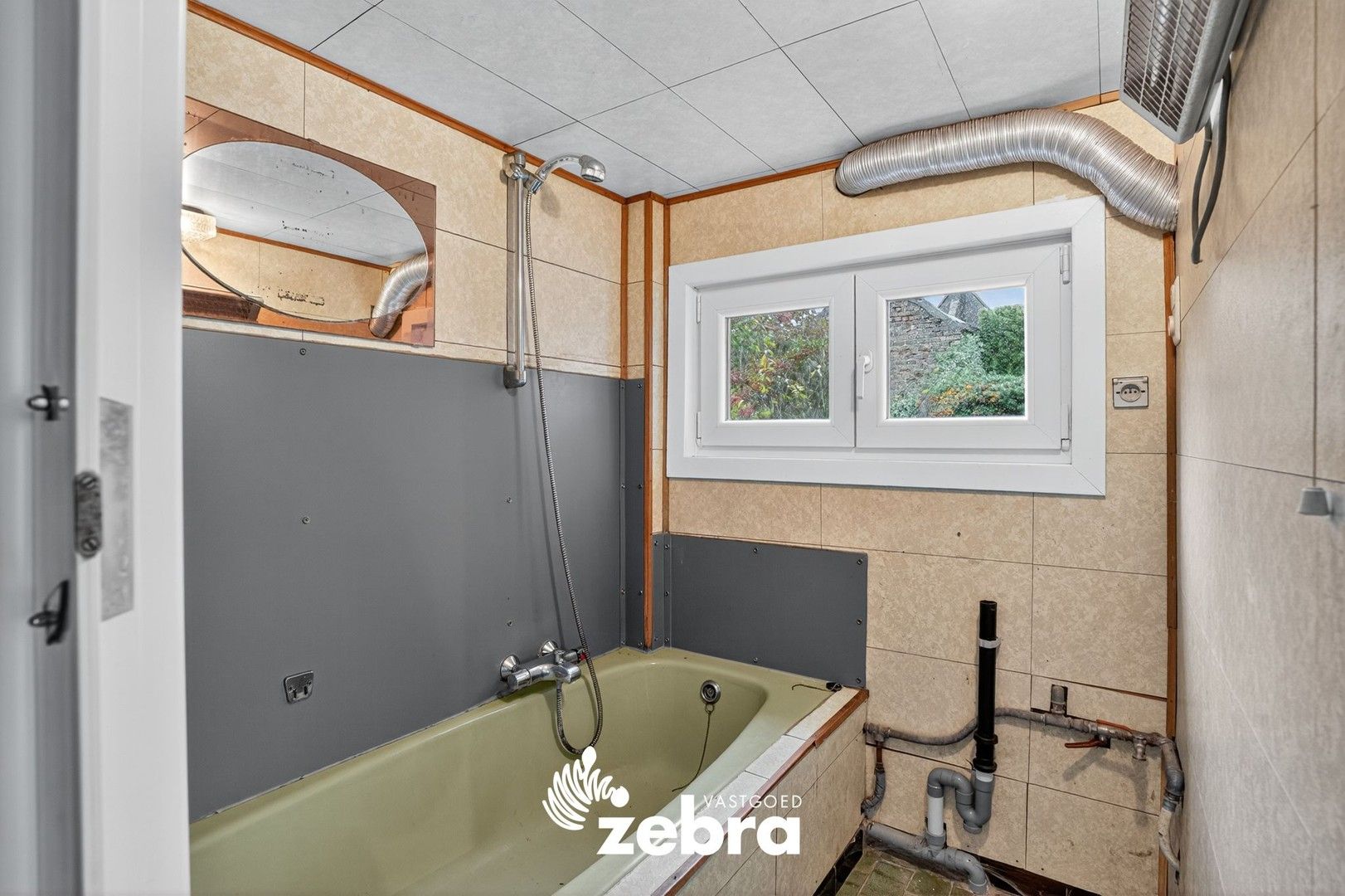 Charmante alleenstaande woning met ruime tuin in Beveren-aan-de-IJzer! foto 22