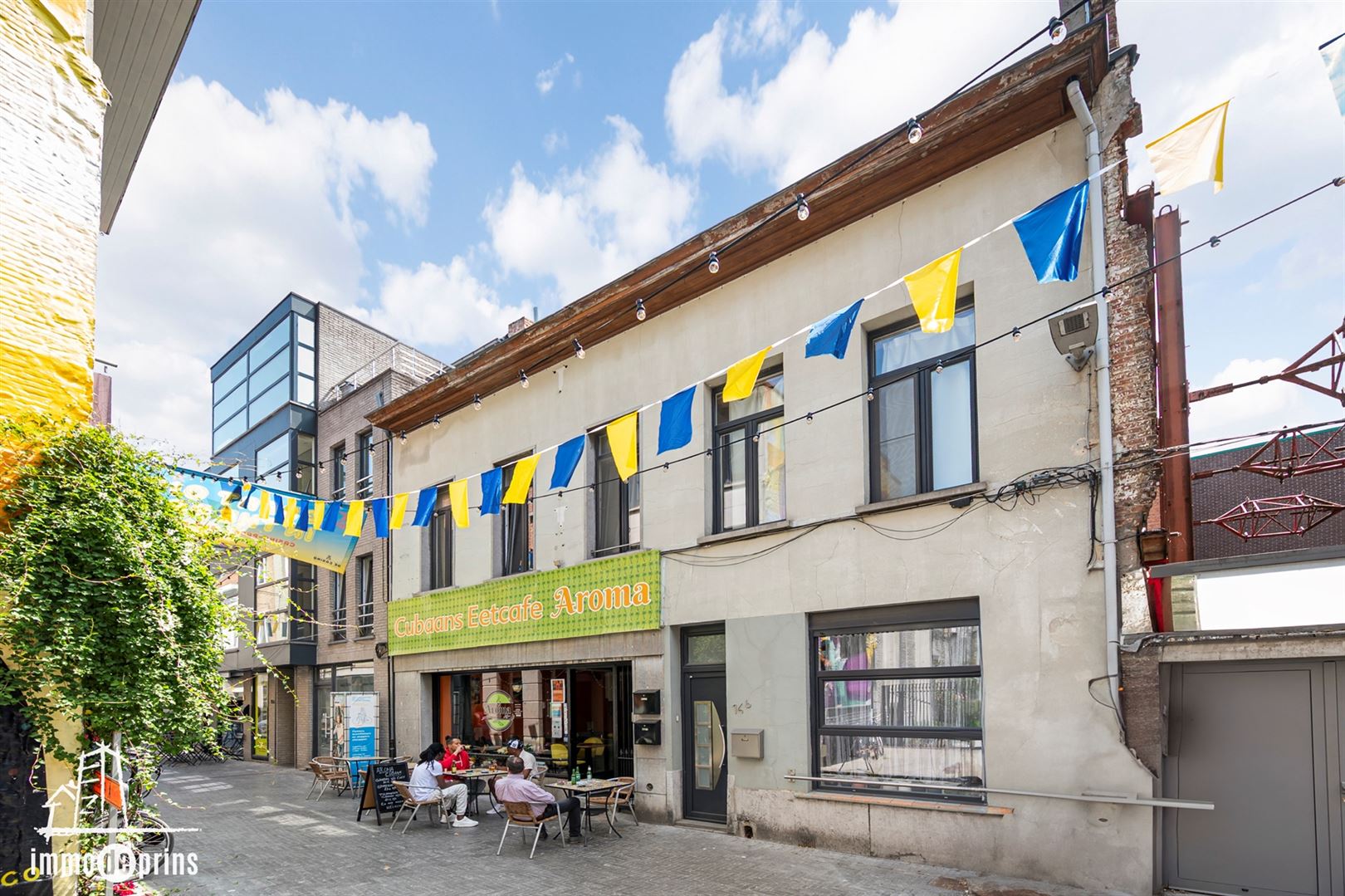 Opbrengsteigendom winkel met woonst +aanpalende woning foto 2