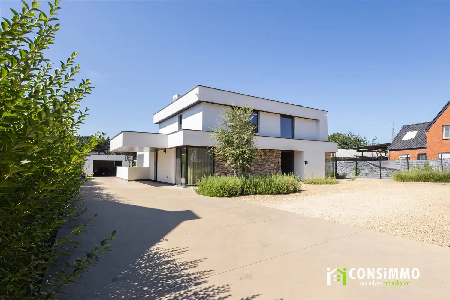 Exclusieve, bijna-energieneutrale villa met hoogwaardige afwerking en uitzonderlijk wooncomfort foto {{pictureIndex}}
