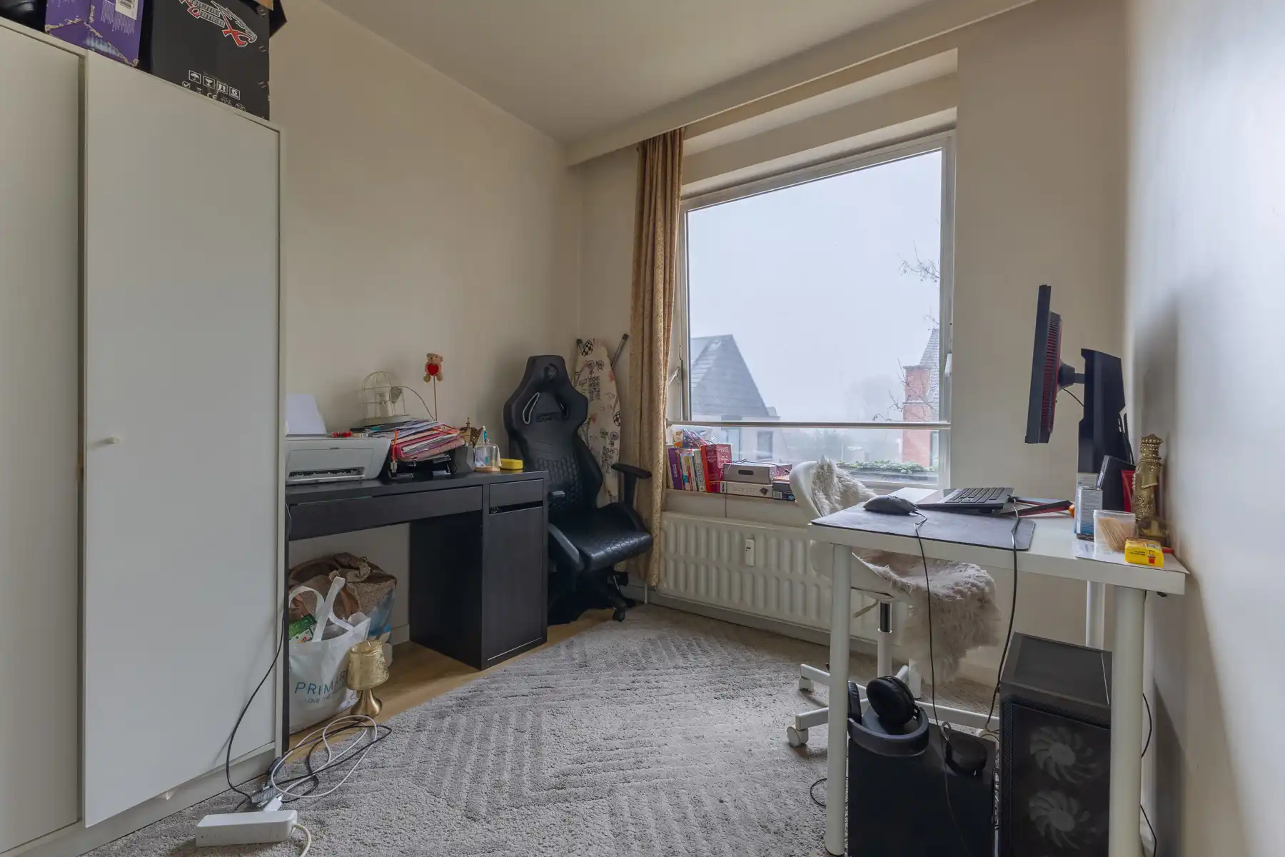 Opbrengsteigendom met 4 wooneenheden en 2 garages foto 13