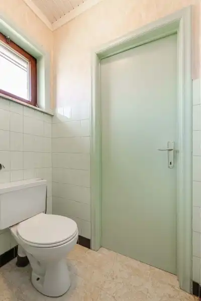 Alleenstaande gelijkvloerse woning met tuin, 3 slaapkamers en inpandige garage centrum wakken TE KOOP foto 9