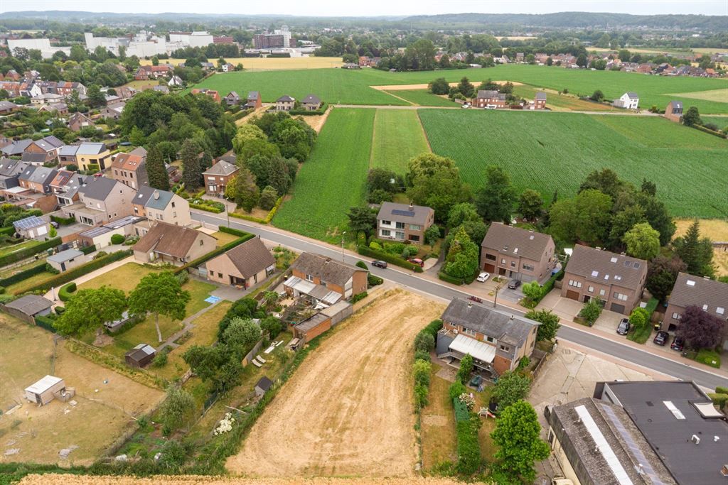 Bouwgrond OB met zicht op velden en avondzon foto 5