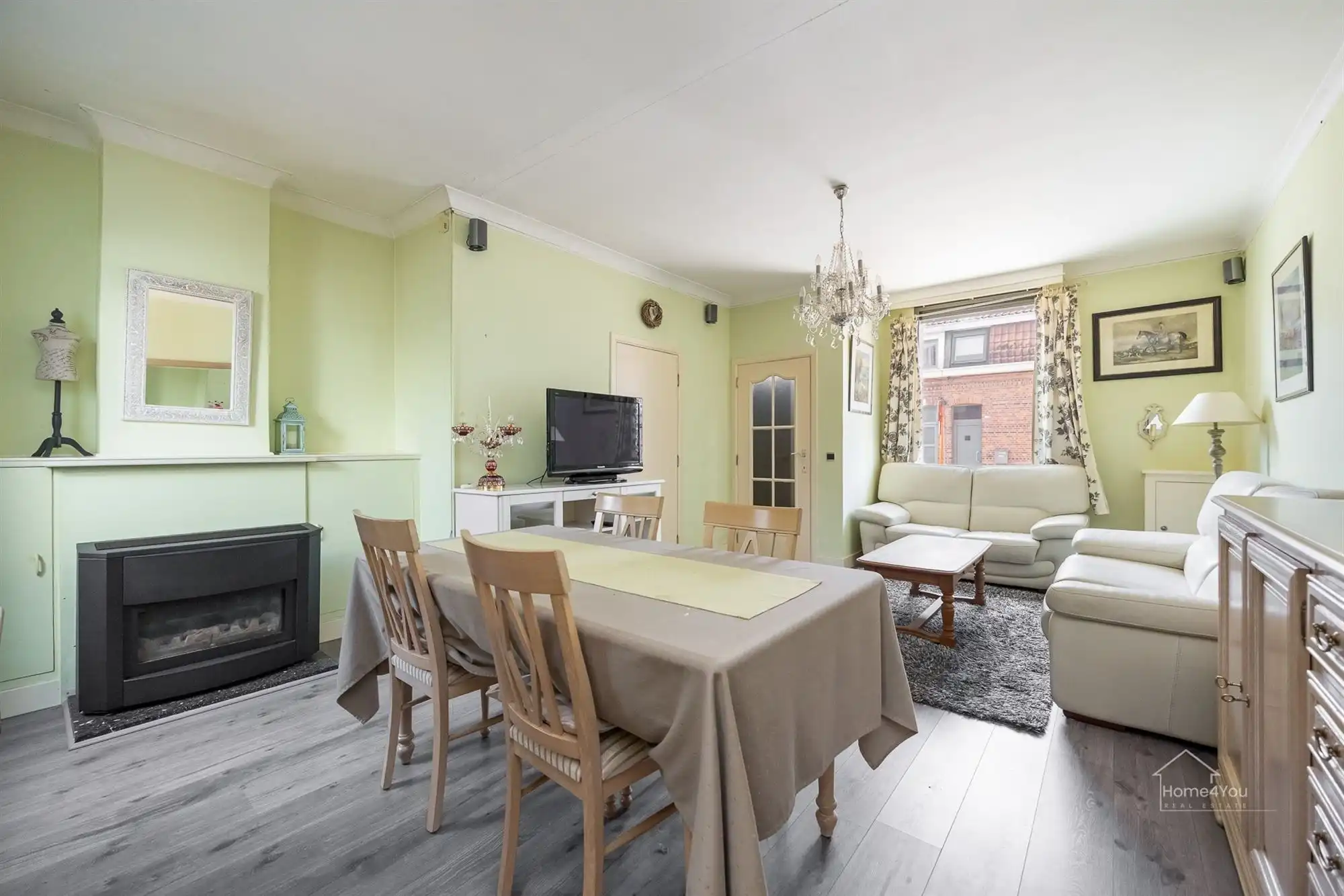 Te renoveren rijwoning met tuintje foto 2