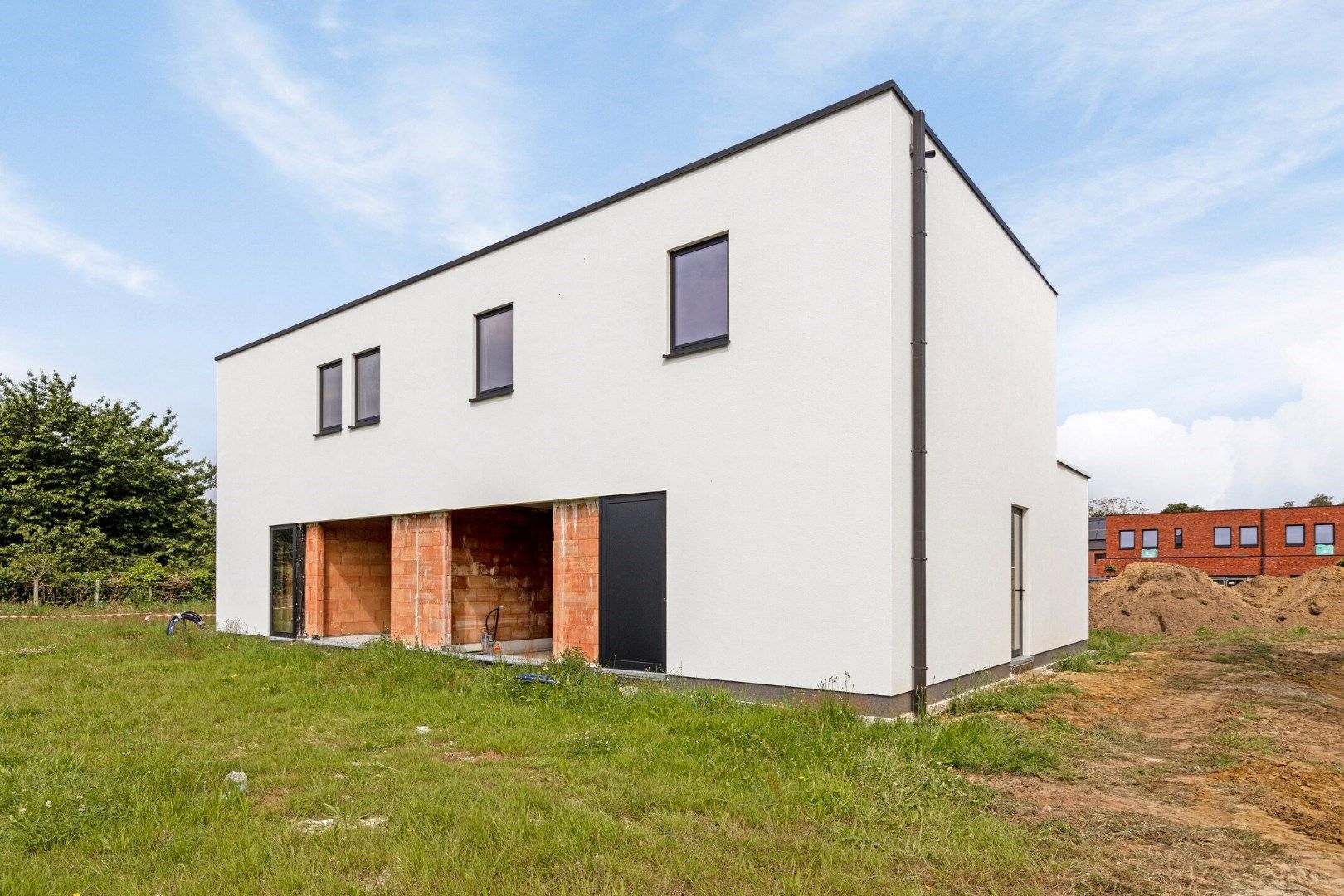 Lot 2B - Casco+ woning met 3 slpks en garage in het centrum van Meerhout ! foto {{pictureIndex}}