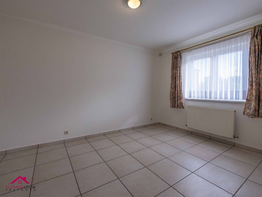 Ruim gelijkvloers appartement met 2 slaapkamers foto 28