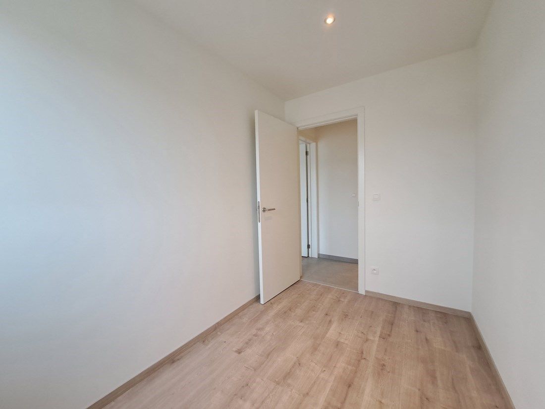 Mooi ruim energiezuinig gelijkvloers appartement te Dilsen-Stokkem foto 9