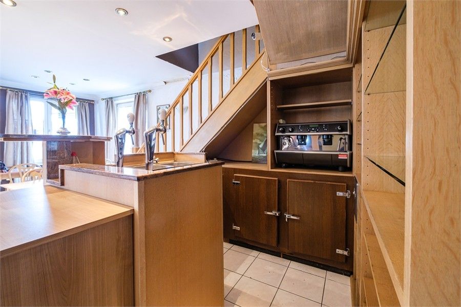 HANDELSHUIS MET VEEL POTENTIEEL IN HET CENTRUM VAN GINGELOM foto 8