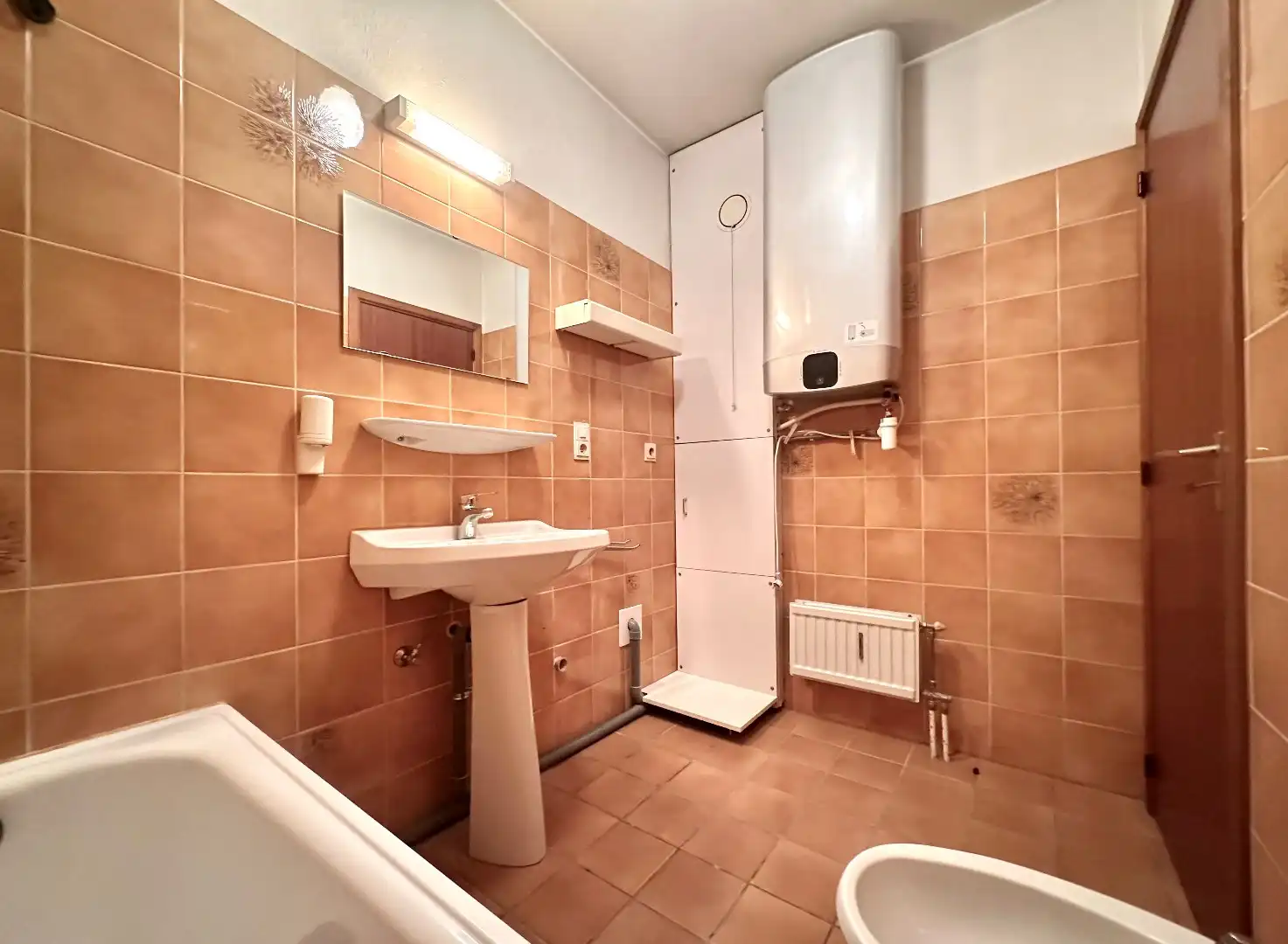 Ruim en centraal gelegen appartement in Tongeren met 2 slaapkamers, terras, garage en berging foto 11