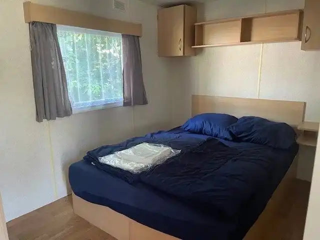 Stacaravan te Zilverstrand voor 8 personen met tuinhuis en terras. foto 9