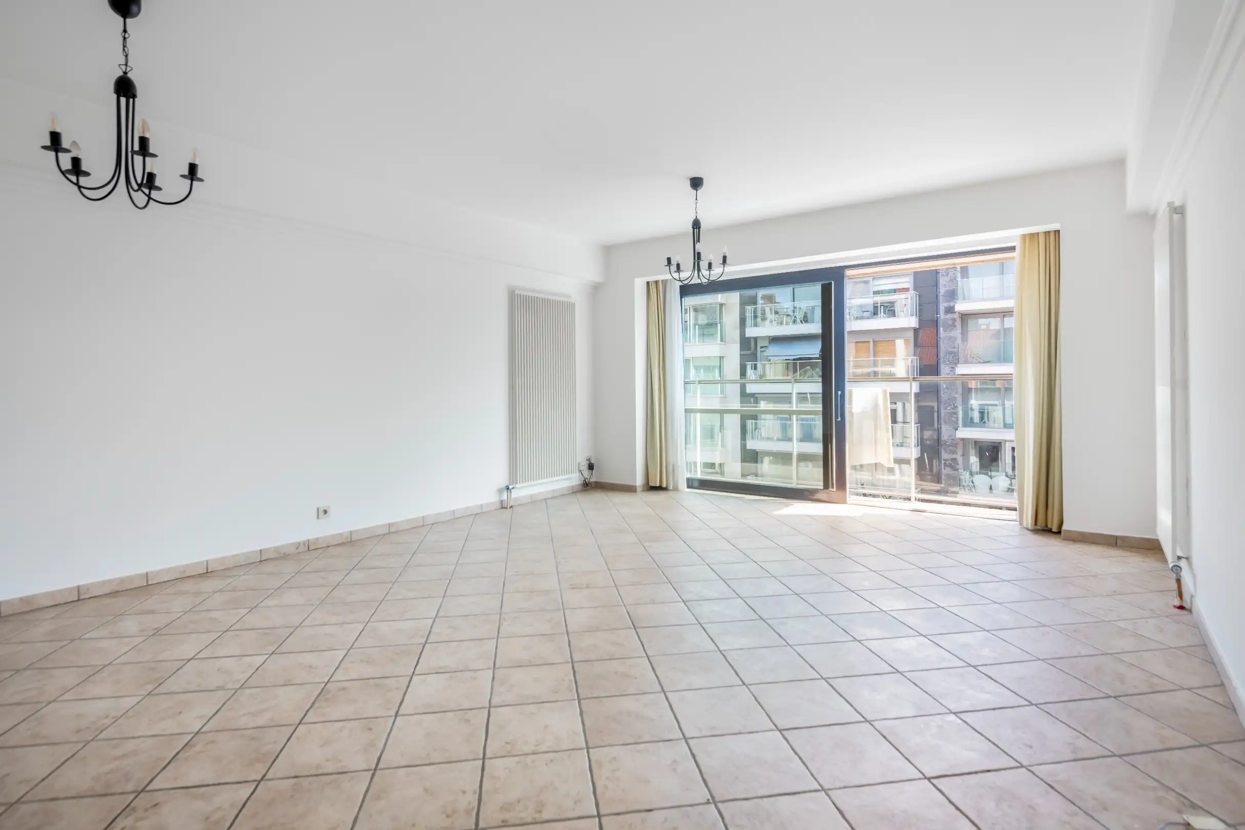 Centraal gelegen appartement met zijdelings zeezicht en zicht op het Van Bunnenplein foto {{pictureIndex}}