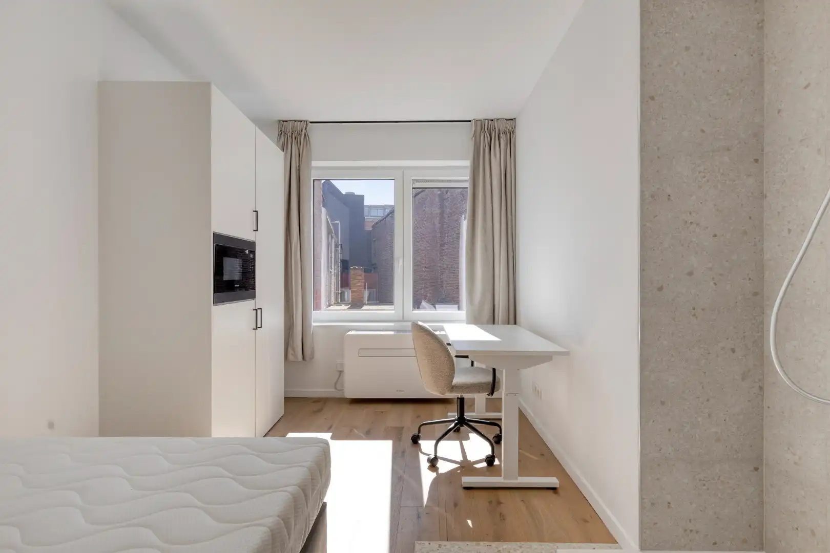 Volledig gerenoveerde studentenkamer in residentie met 15 studentenkamers en een 1slaapkamer appartement in hartje Leuven - EPC label A! foto 3