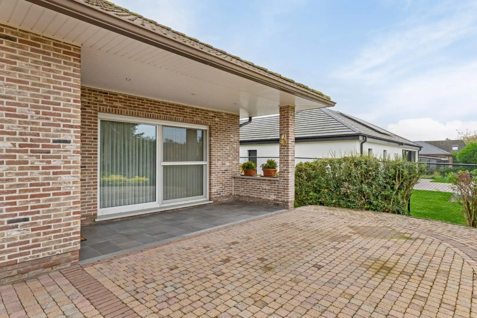 Zeer degelijke open bebouwing met tuin en garage foto 30