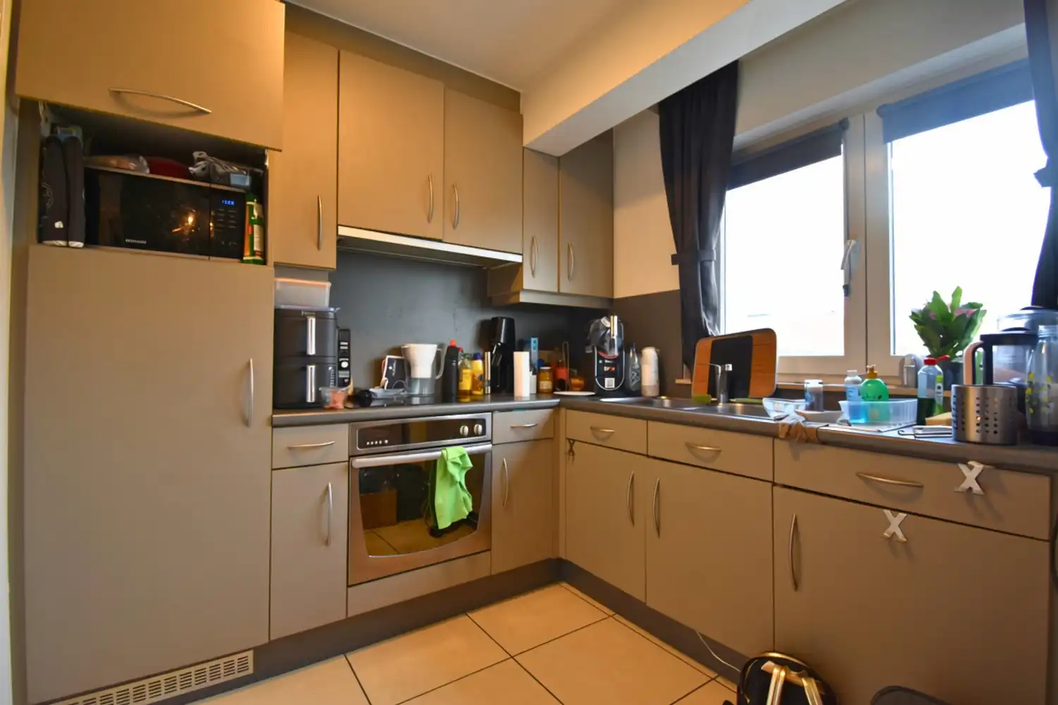 Appartement met 2 slaapkamers, garage en gemeenschappelijke tuin te huur in Sint-Pieters-Leeuw foto 4
