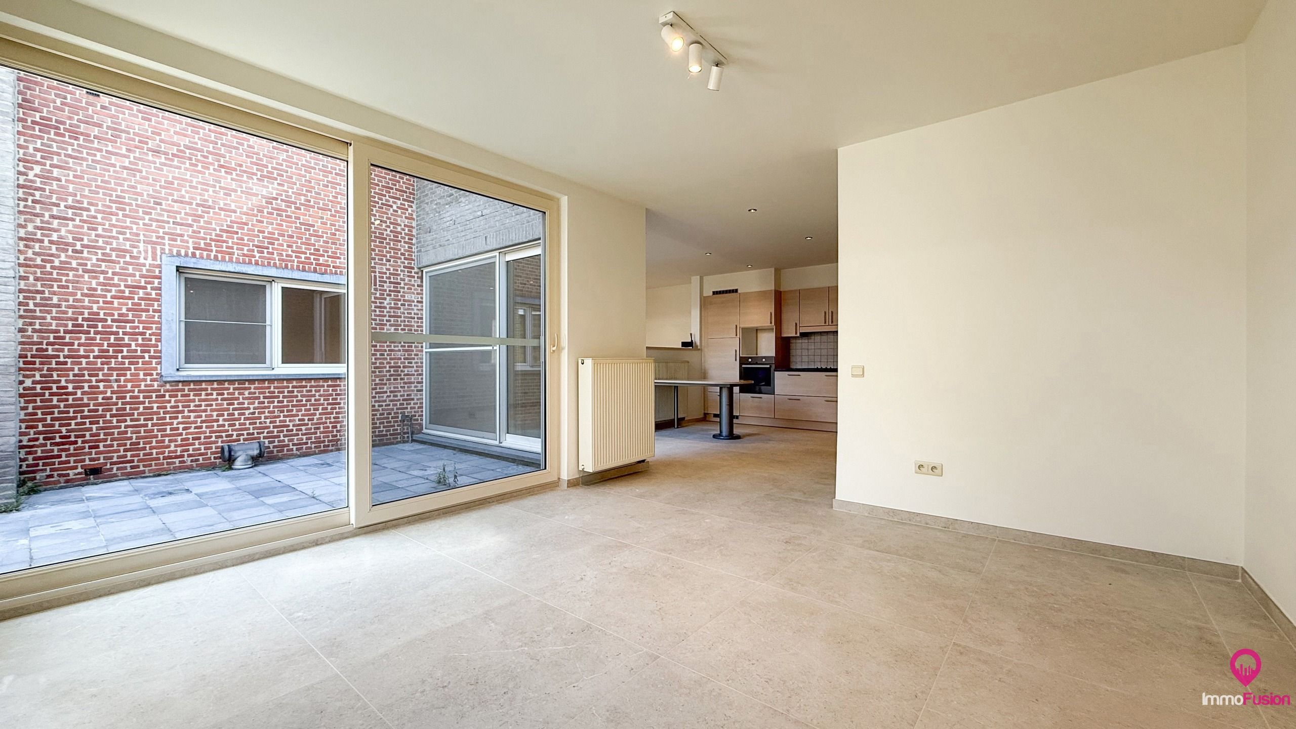 Ruim gelijkvloers appartement met tuin & garage in Beringen! foto 3