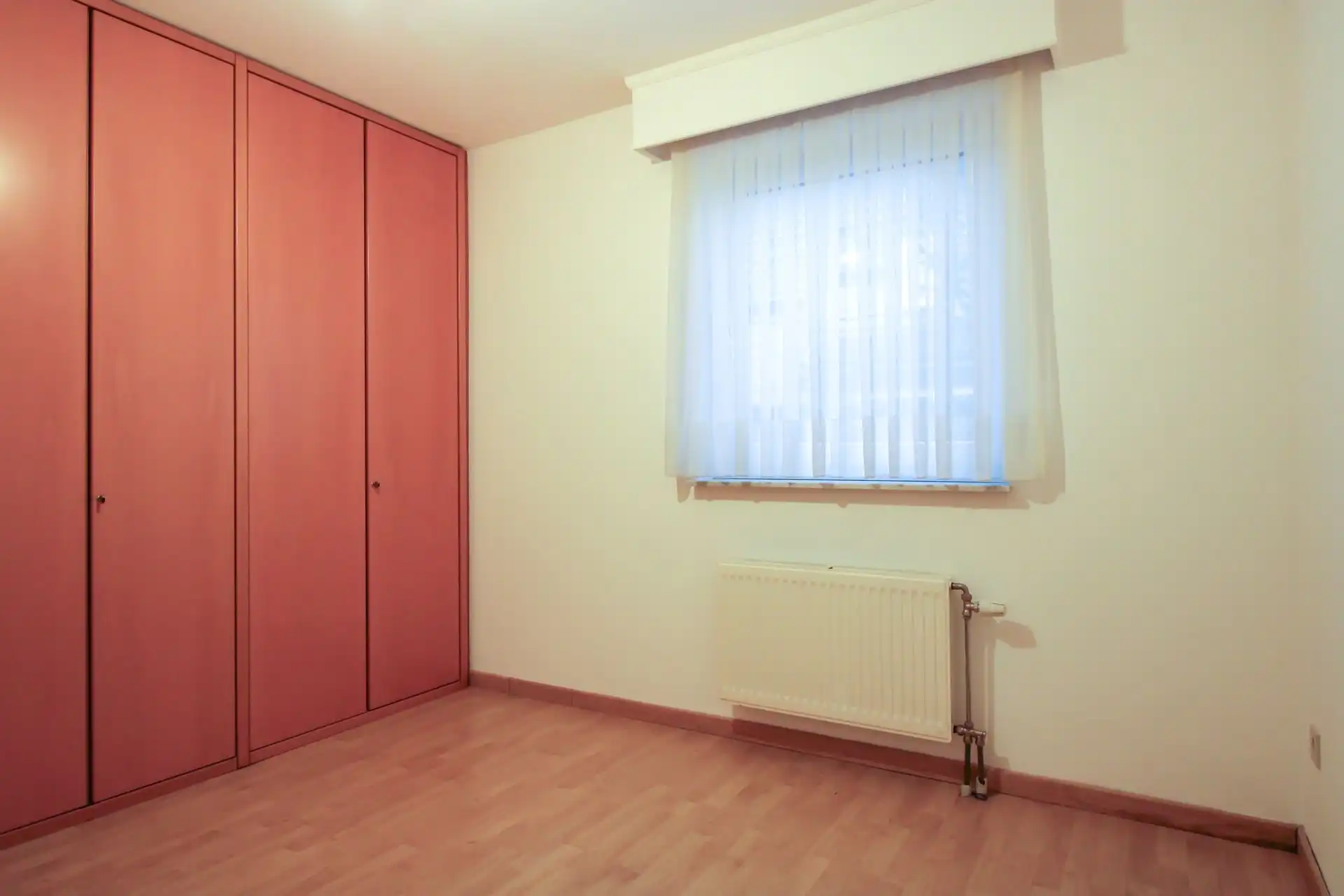 Gelijkvloers appartement met 2 slaapkamers, autostaanplaats en kelderberging in Maasmechelen! foto 11