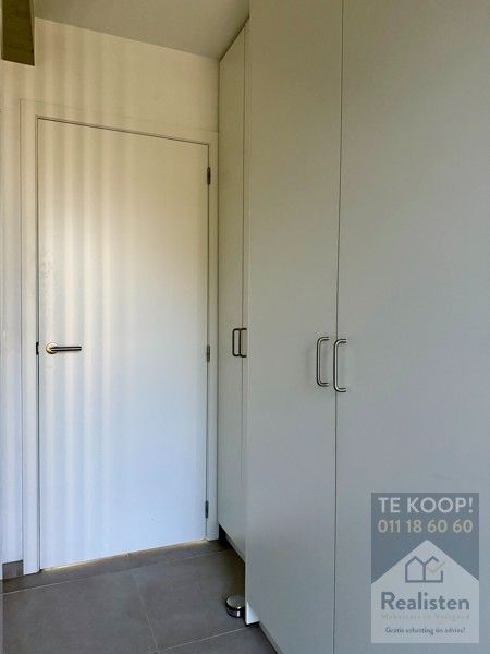 Schakelwoning in hartje Godsheide foto 8
