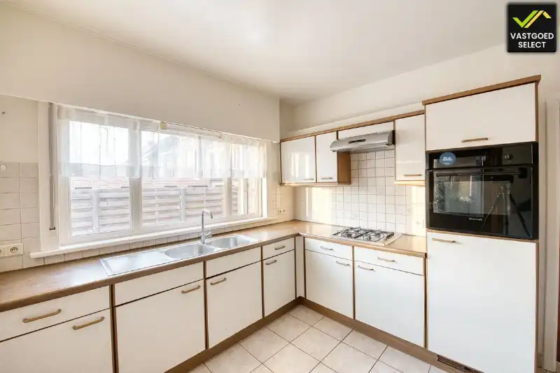 Te renoveren woning met tuin en garage in Sint-Laureins foto 6