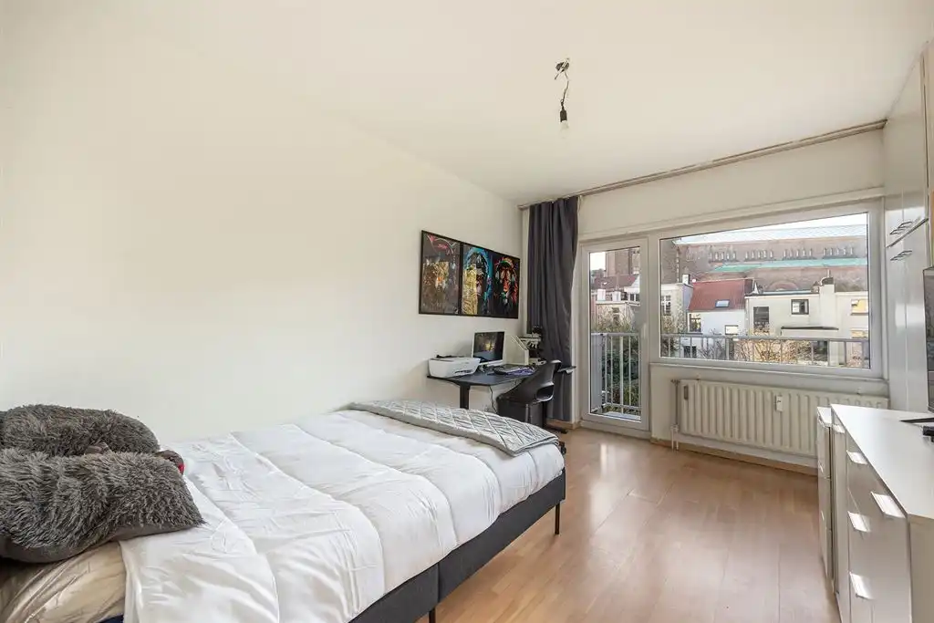 Ruim 3 slpk appartement met terras en garagebox foto 16