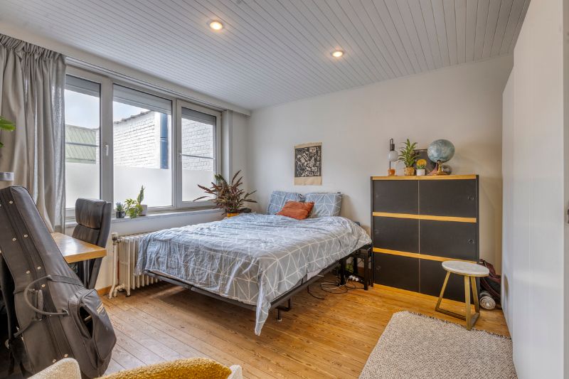Zonnige authentieke woning met tuintje en topligging! foto 14